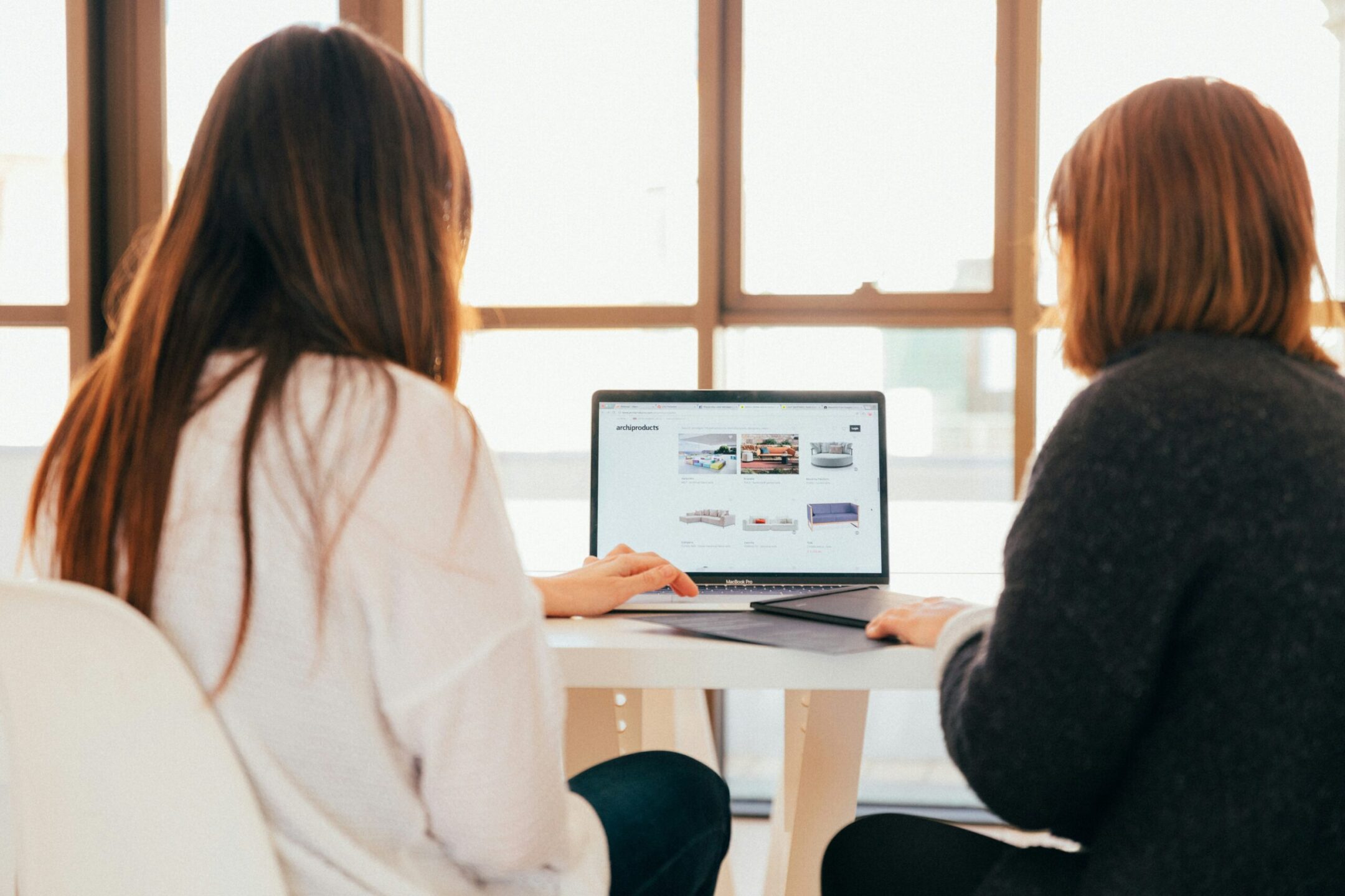 Photo by <a href="https://unsplash.com/@kobuagency?utm_content=creditCopyText&utm_medium=referral&utm_source=unsplash">KOBU Agency</a> on <a href="https://unsplash.com/photos/two-women-talking-while-looking-at-laptop-computer-7okkFhxrxNw?utm_content=creditCopyText&utm_medium=referral&utm_source=unsplash">Unsplash</a><br />
      